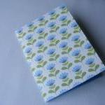 A6 Handmade and Handstitched Notebook with Blue and Green Flowers and Plain Blue Pages