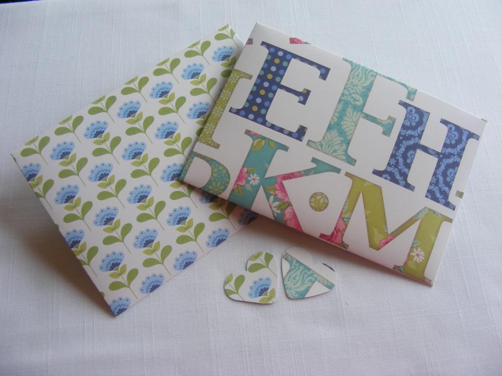 Handmade Envelopes Blue And Green Alphabet And Flowers Design With Matching Heart Shaped Fastening